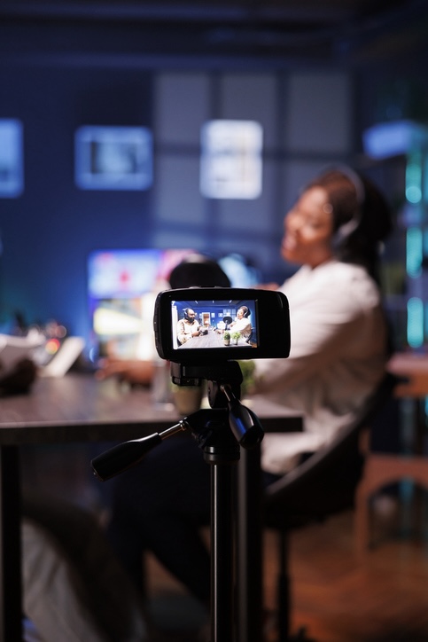 Shot of a young businesswoman using a digital tablet during a late night at work